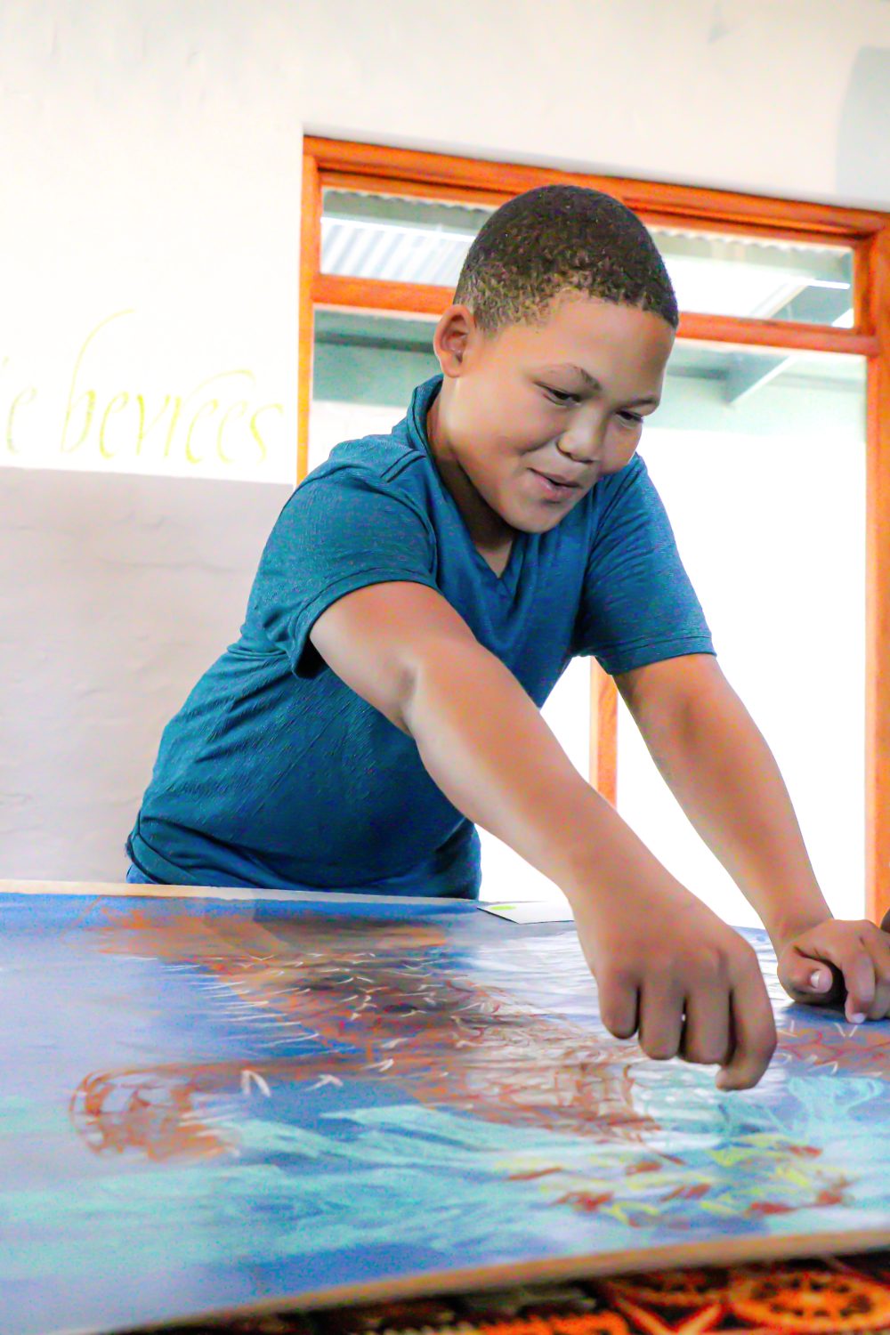 Chrishaydio painting at the Centre