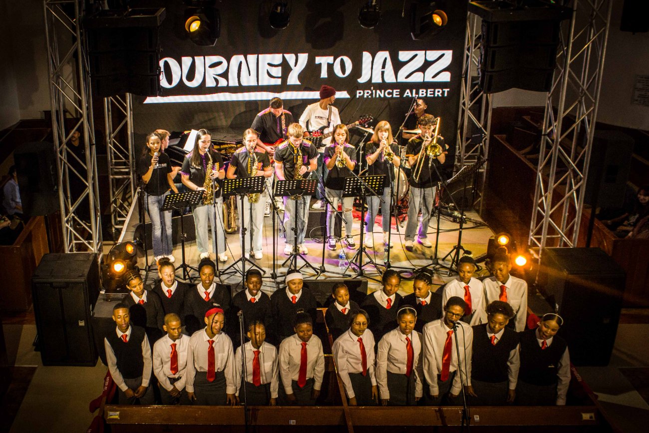 The school choir and Journey to Jazz band performing