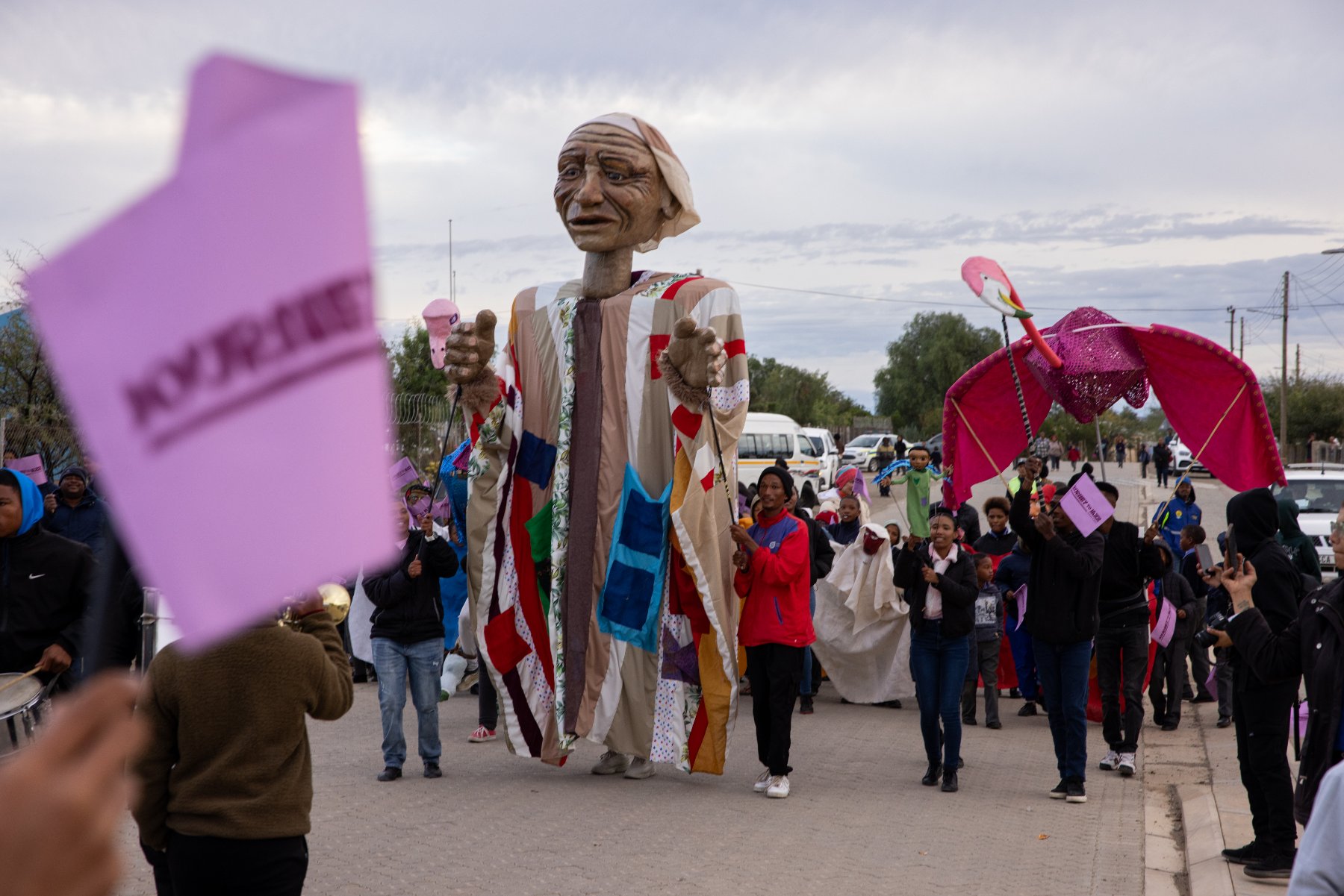 The Outa Lappies giant patchwork puppet leading the Journey to Jazz parade