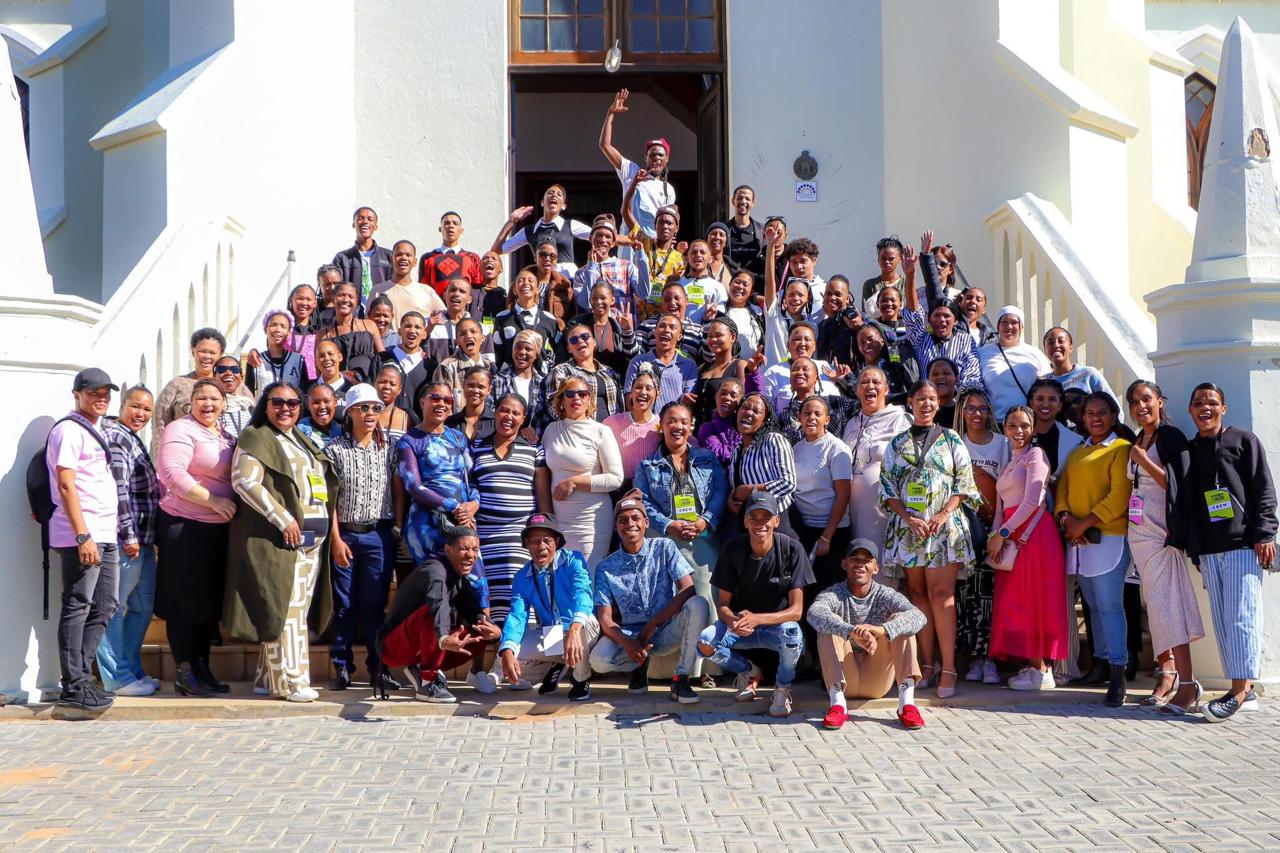 The Journey to Jazz youth crew gathered on the church steps